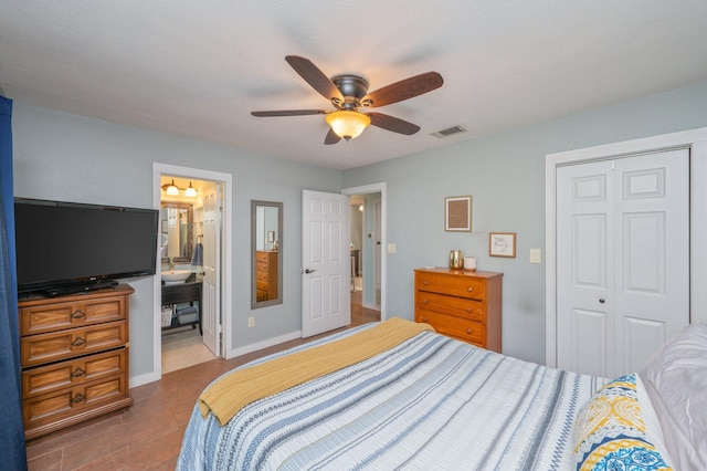 5358 Cox Ln, Crestview, FL 32539 - bedroom with a closet, ceiling fan, and tile patterned flooring