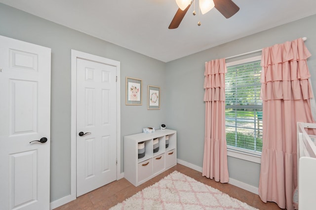 5358 Cox Ln, Crestview, FL 32539 - bedroom with baseboards and a ceiling fan