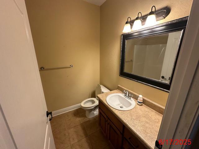 2071 Fountainview Dr, Navarre, FL 32566 - bathroom with vanity and tile patterned flooring