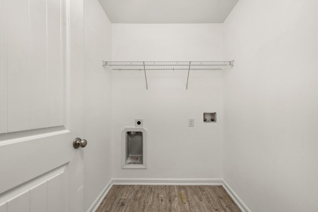 718 Widgeon Way, Crestview, FL 32539 - laundry room with hookup for a washing machine, wood finished floors, and electric dryer hookup