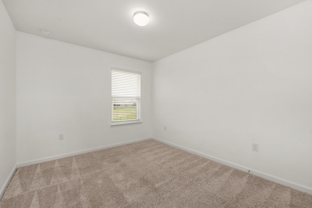 718 Widgeon Way, Crestview, FL 32539 - empty room featuring carpet floors and a smoke detector