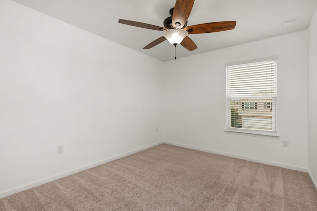 718 Widgeon Way, Crestview, FL 32539 - spare room with carpet floors, a ceiling fan, and a smoke detector