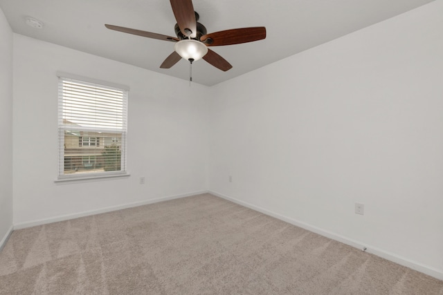 718 Widgeon Way, Crestview, FL 32539 - unfurnished room featuring carpet flooring, a ceiling fan, and a smoke detector