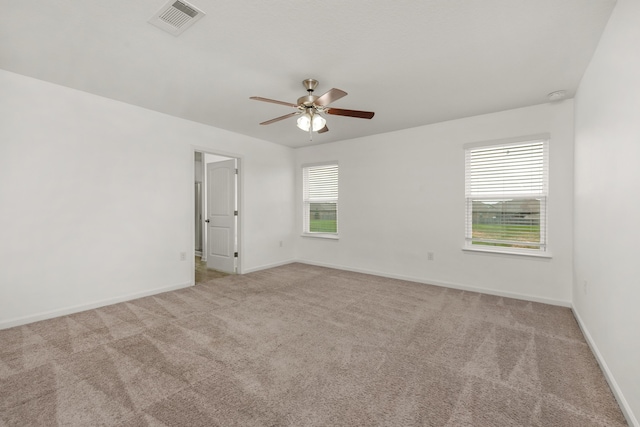 718 Widgeon Way, Crestview, FL 32539 - carpeted empty room featuring a ceiling fan and baseboards