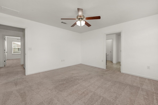 718 Widgeon Way, Crestview, FL 32539 - spare room with a ceiling fan and light carpet