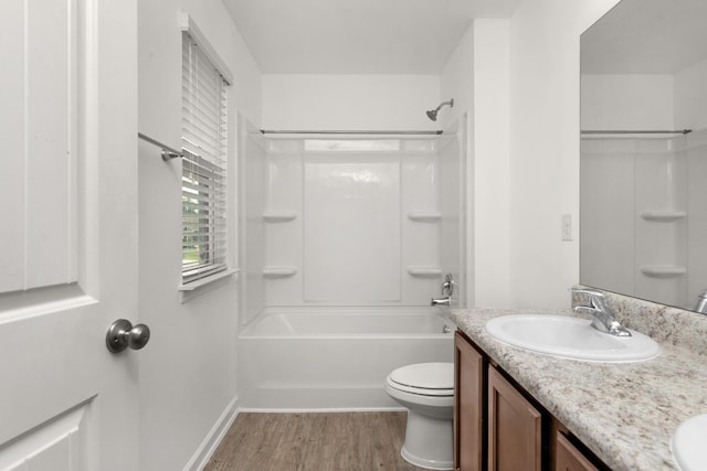 718 Widgeon Way, Crestview, FL 32539 - full bath with wood finished floors, bathing tub / shower combination, and double vanity