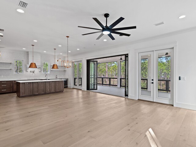 173 Crissman Rd, Santa Rosa Beach, FL 32459 - unfurnished living room with light wood-type flooring, healthy amount of natural light, a ceiling fan, and recessed lighting