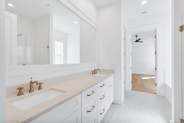314 W Firethorn Cir Lot 33, Watersound, FL 32461 - full bathroom with double vanity, a shower stall, tile patterned floors, recessed lighting, and ceiling fan