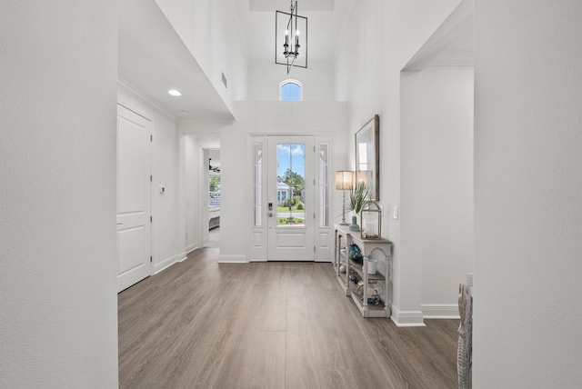 8324 Fins Up Ct, Panama City Beach, FL 32413 - entryway with wood finished floors and a chandelier