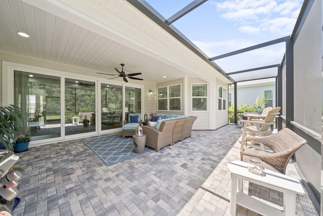 8324 Fins Up Ct, Panama City Beach, FL 32413 - sunroom featuring ceiling fan and an outdoor hangout area