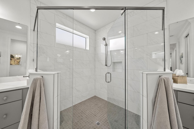 8324 Fins Up Ct, Panama City Beach, FL 32413 - bathroom with vanity, a stall shower, and ornamental molding