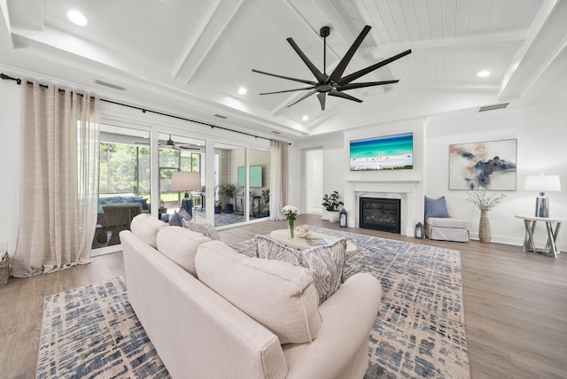 8324 Fins Up Ct, Panama City Beach, FL 32413 - living room with a ceiling fan, wood finished floors, recessed lighting, and a glass covered fireplace