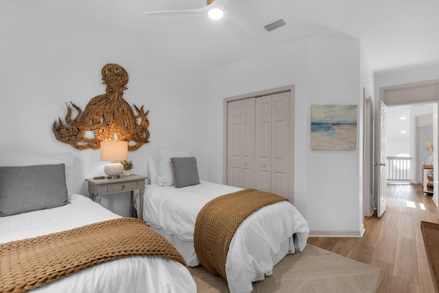 961 Northshore Dr, Miramar Beach, FL 32550 - bedroom featuring a closet, light wood finished floors, and ceiling fan