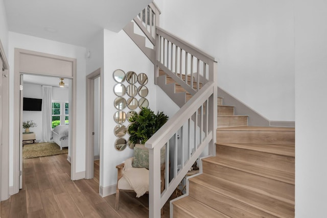 961 Northshore Dr, Miramar Beach, FL 32550 - stairway featuring wood finished floors and baseboards