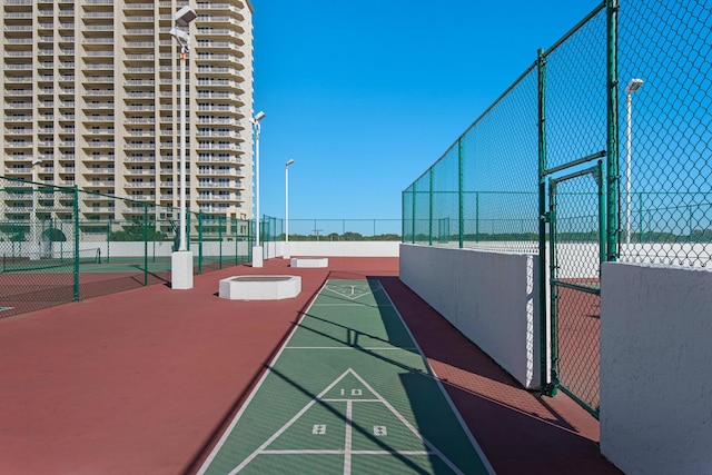 1096 Scenic Gulf Dr Unit 311, Miramar Beach, FL 32550 - view of property's community with shuffleboard and a tennis court