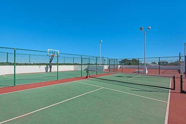 1096 Scenic Gulf Dr Unit 311, Miramar Beach, FL 32550 - view of tennis court with community basketball court