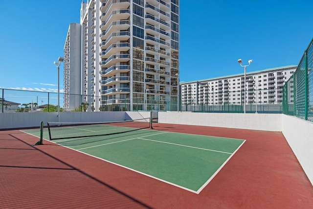 1096 Scenic Gulf Dr Unit 311, Miramar Beach, FL 32550 - view of tennis court with community basketball court