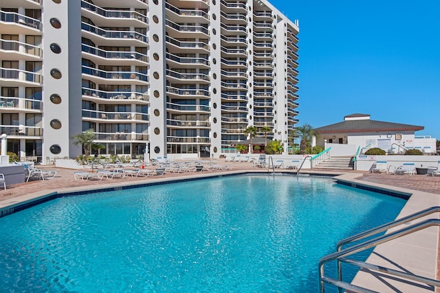 1096 Scenic Gulf Dr Unit 311, Miramar Beach, FL 32550 - community pool with a patio area