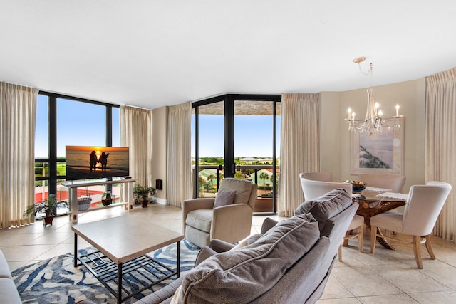 1096 Scenic Gulf Dr Unit 311, Miramar Beach, FL 32550 - living area featuring floor to ceiling windows, a chandelier, and light tile patterned floors
