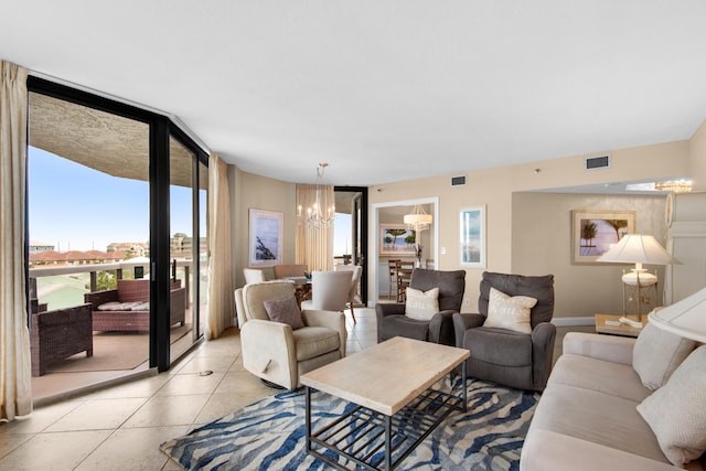 1096 Scenic Gulf Dr Unit 311, Miramar Beach, FL 32550 - living area featuring a chandelier, plenty of natural light, a wall of windows, and light tile patterned flooring