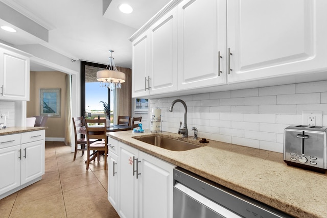1096 Scenic Gulf Dr Unit 311, Miramar Beach, FL 32550 - kitchen featuring dishwasher, tasteful backsplash, white cabinetry, light stone counters, and recessed lighting