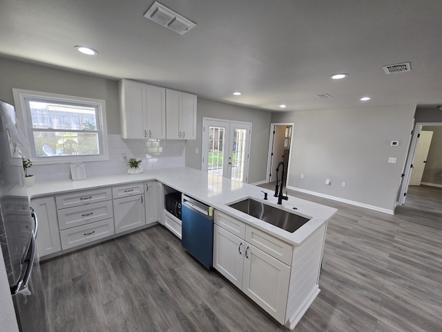 726 Clark Dr, Fort Walton Beach, FL 32547 - kitchen featuring dishwashing machine, a peninsula, recessed lighting, tasteful backsplash, and healthy amount of natural light