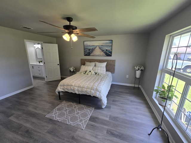726 Clark Dr, Fort Walton Beach, FL 32547 - bedroom with dark wood-style floors, a ceiling fan, and ensuite bath