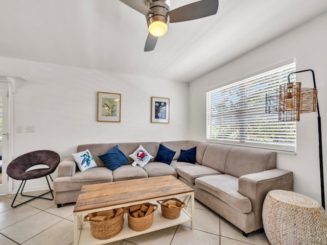 92 Tarpon St, Destin, FL 32541 - living area with light tile patterned floors, healthy amount of natural light, and ceiling fan