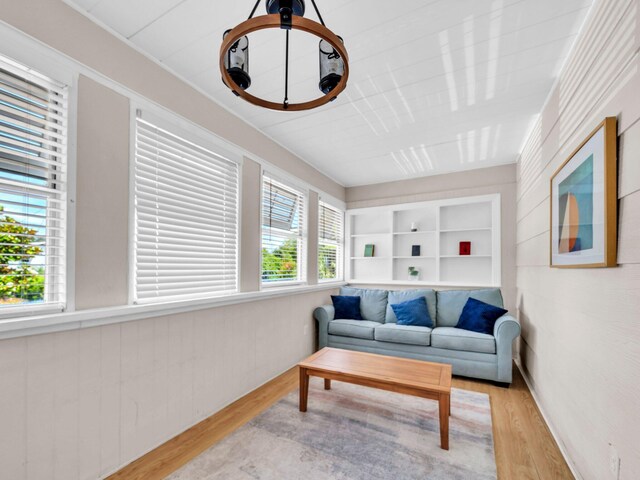 92 Tarpon St, Destin, FL 32541 - living room with wood finished floors and built in features
