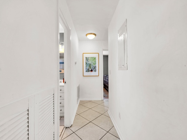 92 Tarpon St, Destin, FL 32541 - hall featuring light tile patterned floors and baseboards