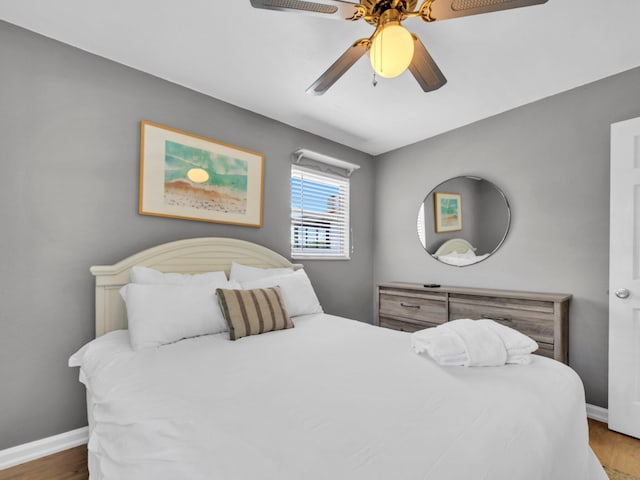 92 Tarpon St, Destin, FL 32541 - bedroom featuring wood finished floors and a ceiling fan