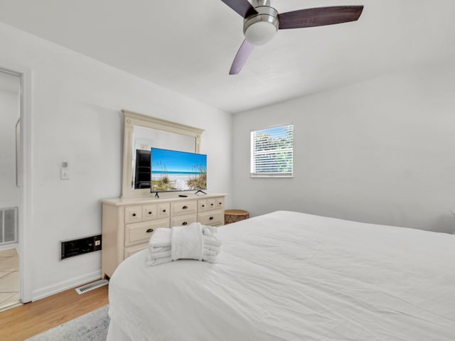 92 Tarpon St, Destin, FL 32541 - bedroom featuring wood finished floors and ceiling fan