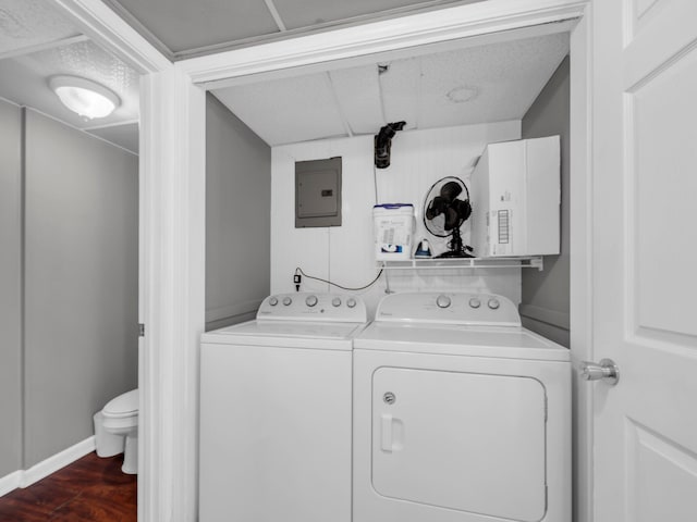 92 Tarpon St, Destin, FL 32541 - laundry room featuring washer and clothes dryer, electric panel, and dark wood-style floors