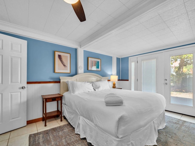 92 Tarpon St, Destin, FL 32541 - bedroom with access to exterior, tile patterned floors, a ceiling fan, crown molding, and a wainscoted wall