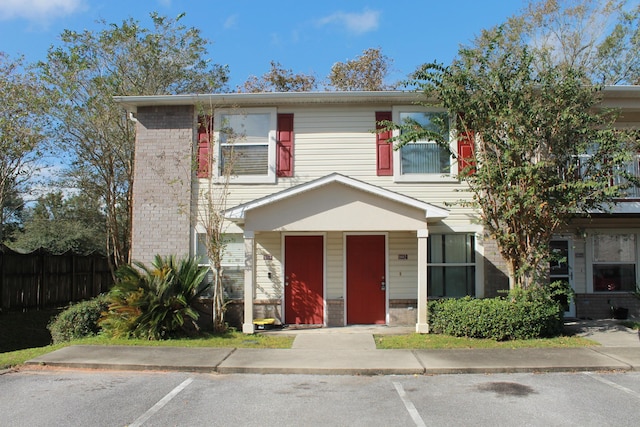 1802 Shay-Lin Ct, Niceville, FL 32578 - townhome / multi-family property featuring uncovered parking and brick siding