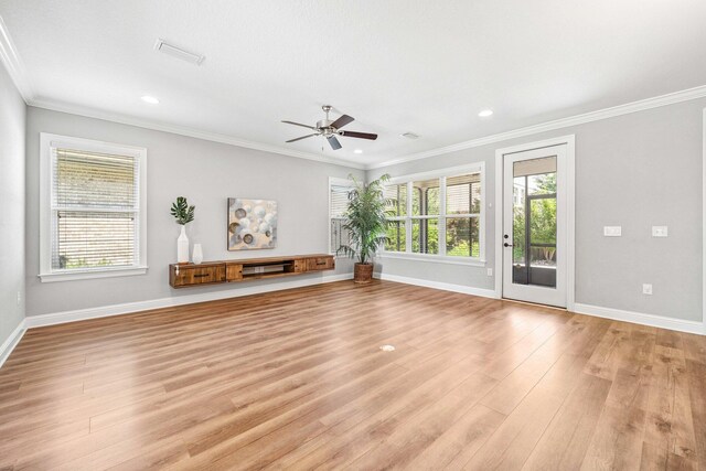 129 Meadow Lake Dr, Freeport, FL 32439 - unfurnished living room featuring light wood finished floors, ceiling fan, ornamental molding, and recessed lighting