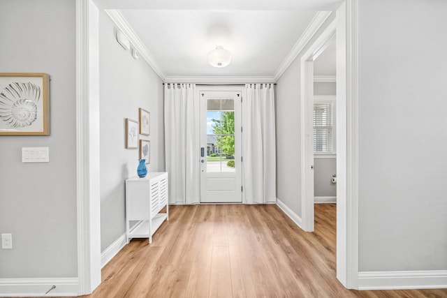 129 Meadow Lake Dr, Freeport, FL 32439 - entrance foyer with light wood finished floors and ornamental molding