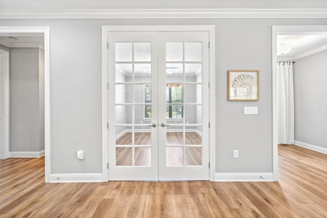 129 Meadow Lake Dr, Freeport, FL 32439 - unfurnished bedroom with french doors, wood finished floors, and ornamental molding