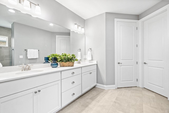 129 Meadow Lake Dr, Freeport, FL 32439 - full bath with double vanity, a tile shower, and recessed lighting