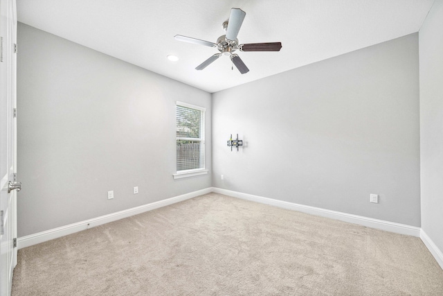 129 Meadow Lake Dr, Freeport, FL 32439 - unfurnished room with light colored carpet and ceiling fan