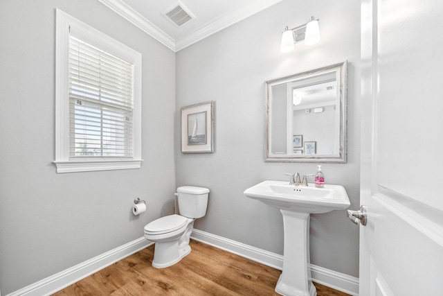 129 Meadow Lake Dr, Freeport, FL 32439 - bathroom with ornamental molding and wood finished floors