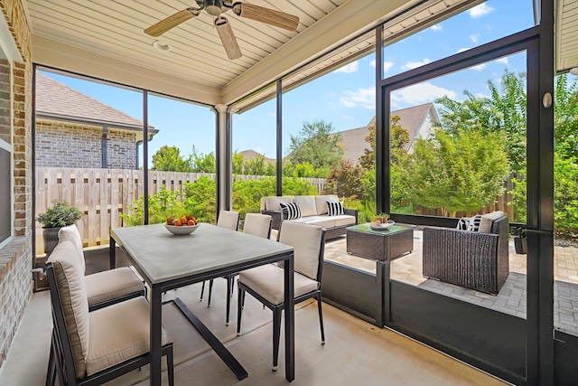 129 Meadow Lake Dr, Freeport, FL 32439 - sunroom / solarium with ceiling fan, an outdoor living space, and outdoor dining space