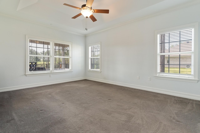 180 Gulf Pines Ct, Freeport, FL 32439 - empty room with crown molding, healthy amount of natural light, dark colored carpet, and ceiling fan