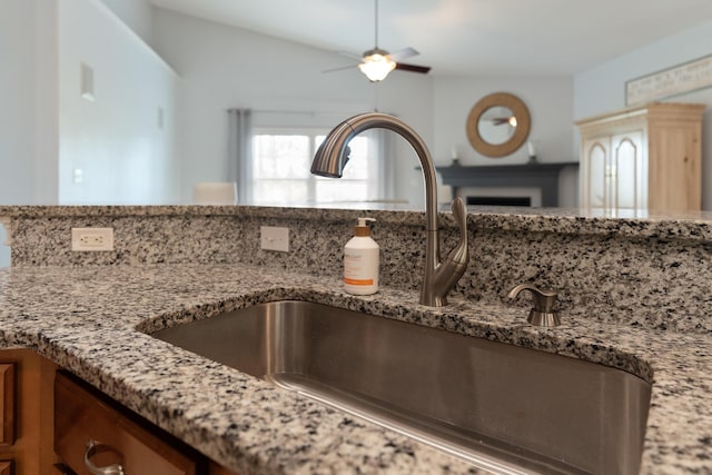 180 Gulf Pines Ct, Freeport, FL 32439 - kitchen view of light stone countertops and ceiling fan