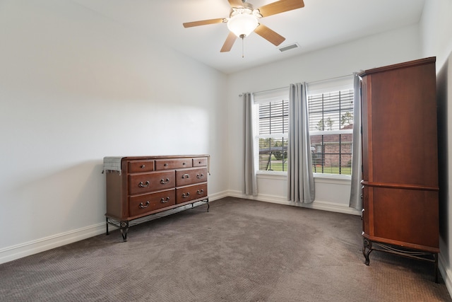 180 Gulf Pines Ct, Freeport, FL 32439 - bedroom featuring dark colored carpet and a ceiling fan