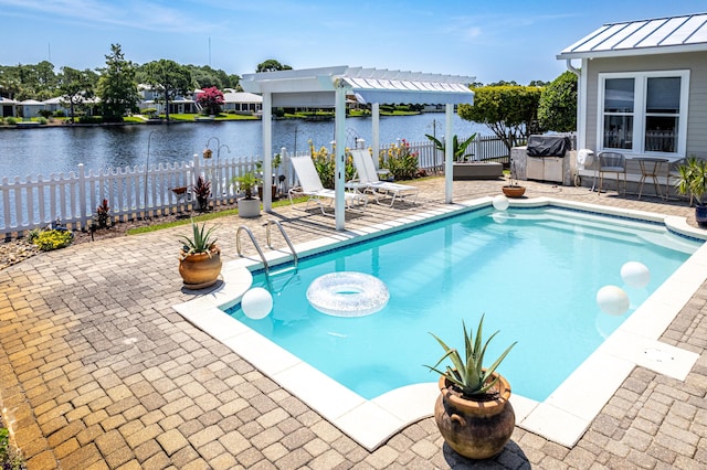 2077 Olde Towne Ave, Miramar Beach, FL 32550 - view of swimming pool with a pergola, a patio, and a water view