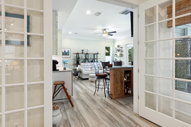 2077 Olde Towne Ave, Miramar Beach, FL 32550 - interior space with ornamental molding, a ceiling fan, light wood-style flooring, and recessed lighting