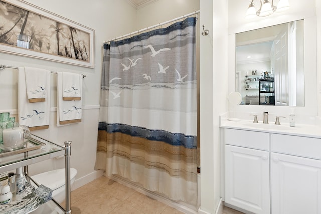 2077 Olde Towne Ave, Miramar Beach, FL 32550 - bathroom with crown molding, vanity, and tile patterned flooring