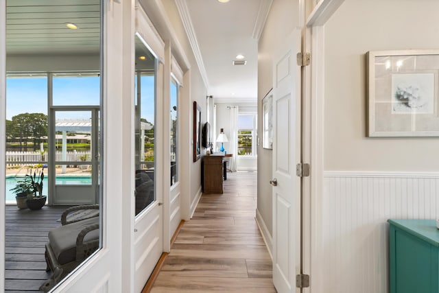 2077 Olde Towne Ave, Miramar Beach, FL 32550 - corridor featuring light wood-type flooring, ornamental molding, a wainscoted wall, and recessed lighting
