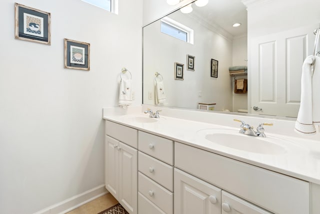 2077 Olde Towne Ave, Miramar Beach, FL 32550 - bathroom featuring double vanity and crown molding